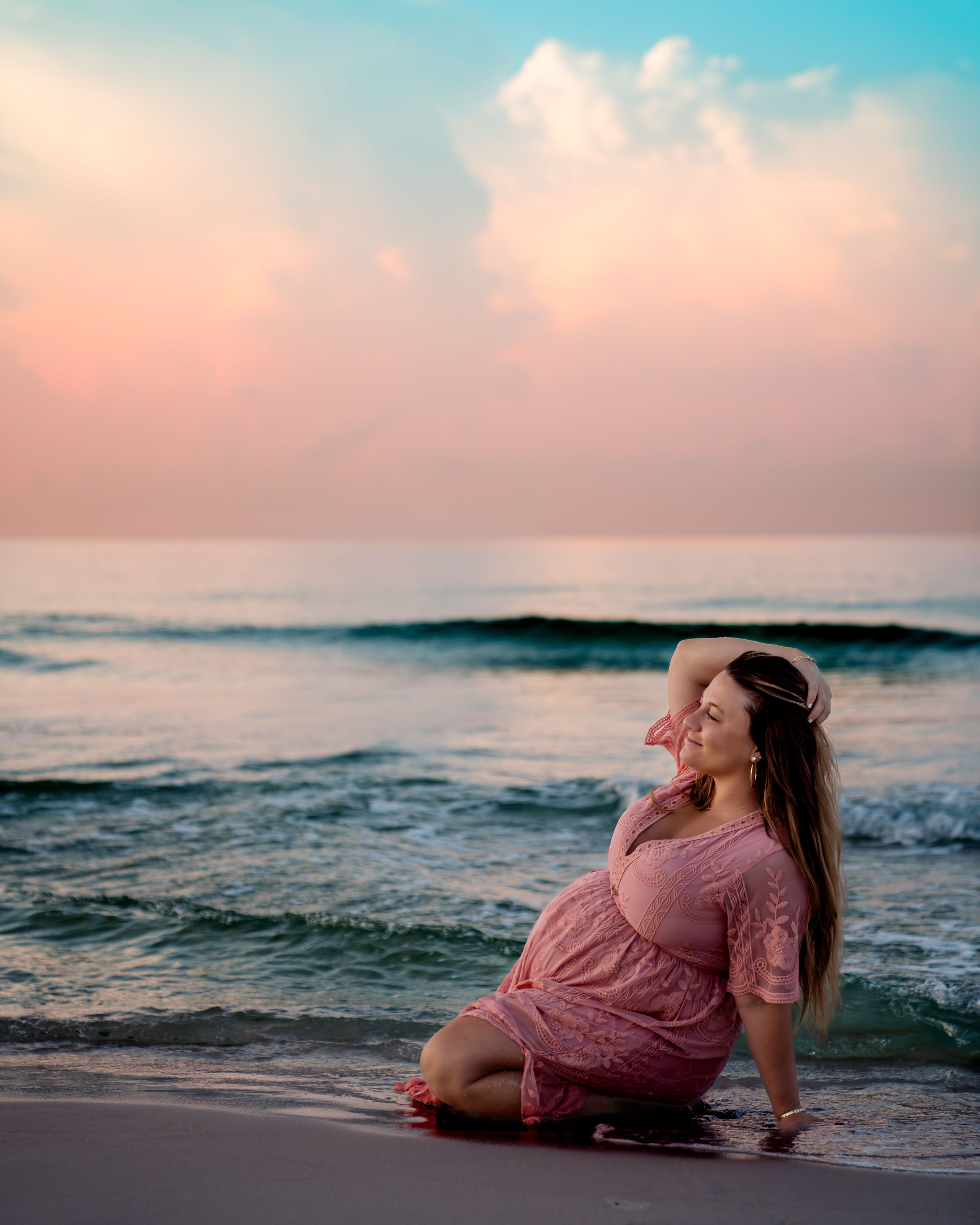 Artistic pregnancy photography emphasizing emotion and form, photographed by Sierra Lopez Productions.