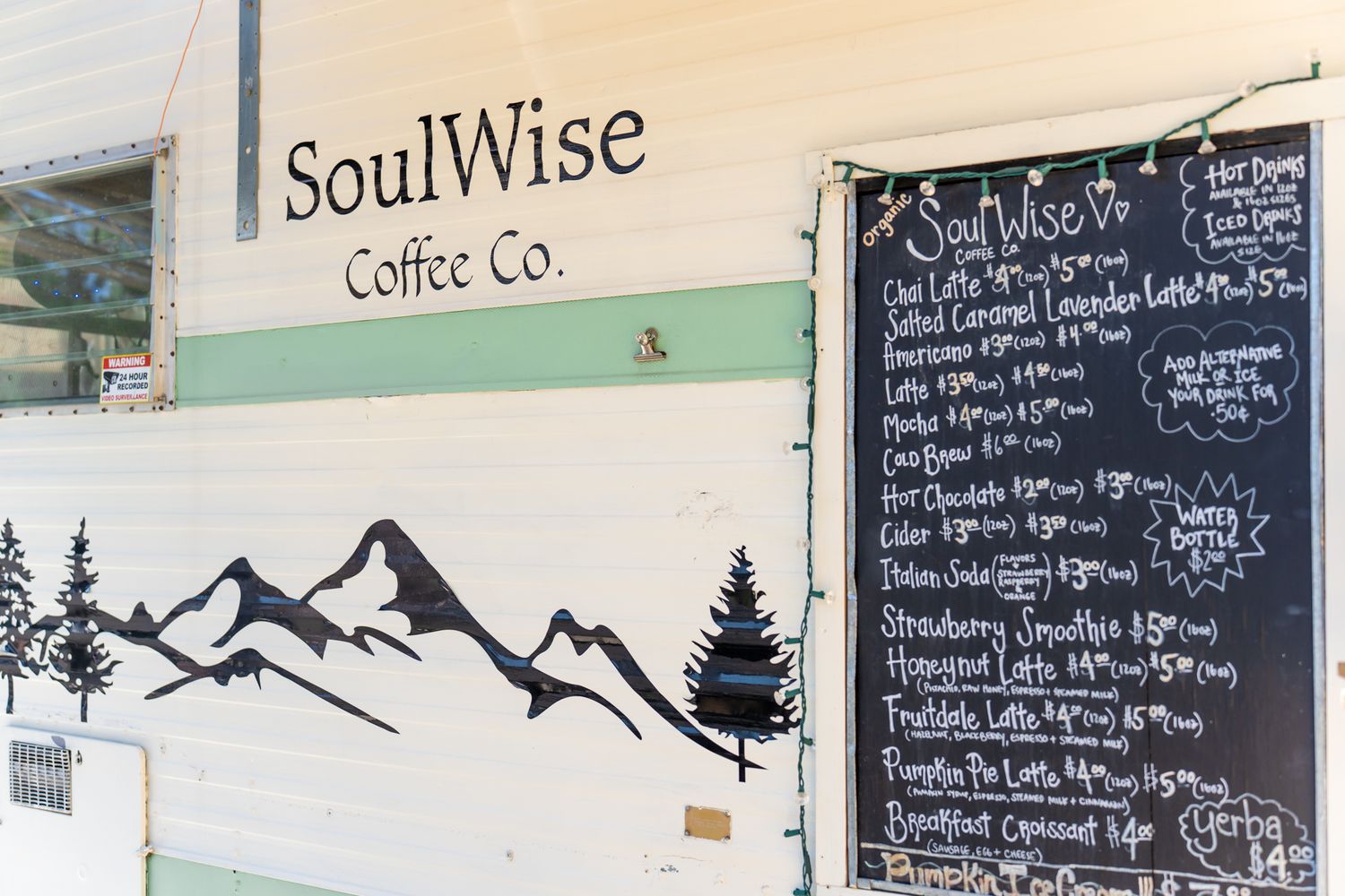 SoulWise Coffee menu on vintage camper food truck