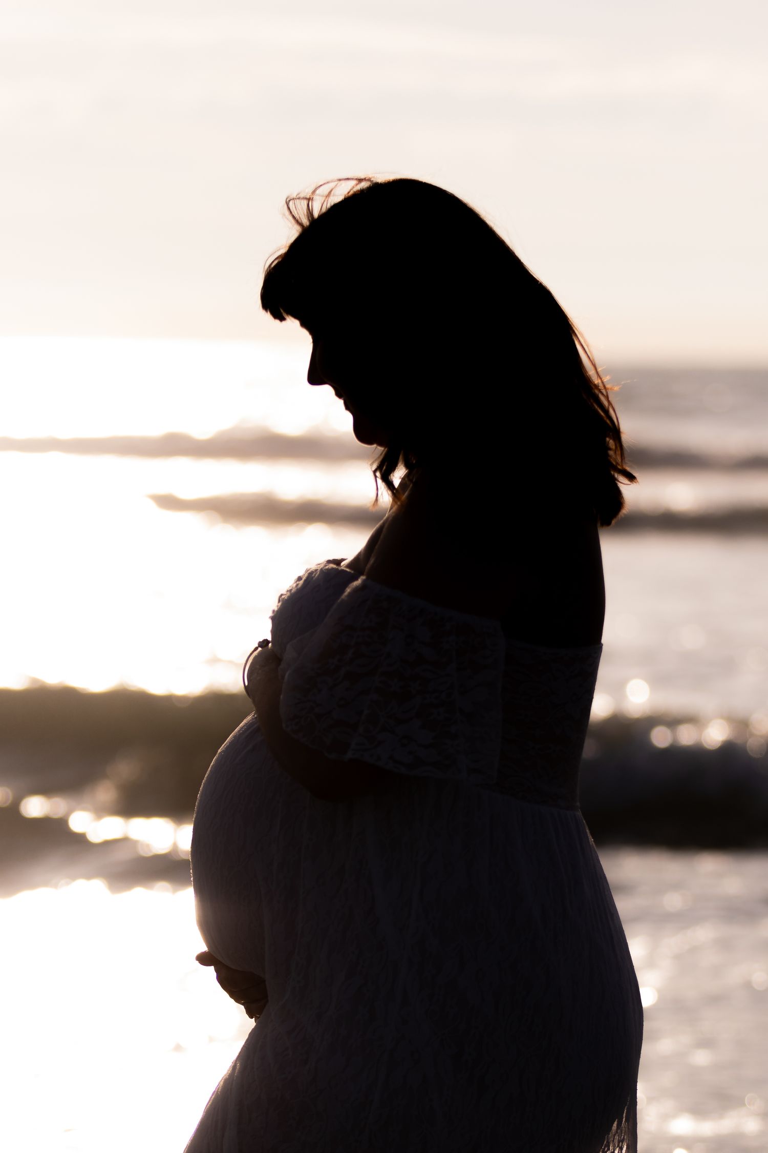 Palmerston North Newborn Baby Family Photographer. Beach Maternity at Foxton beach Silhouette