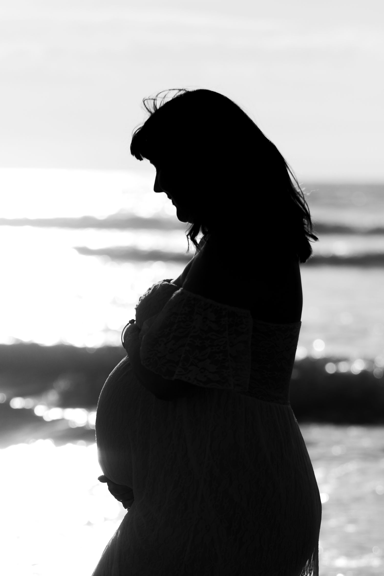 Palmerston North Newborn Baby Family Photographer. Beach Maternity at Foxton beach silhouette black and white