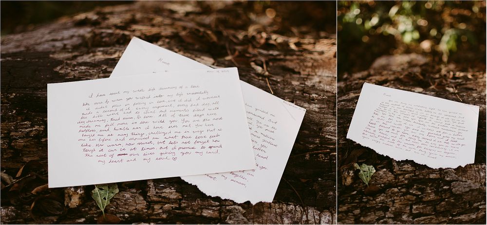 Two white handwritten letters placed on weathered wood in natural lighting.