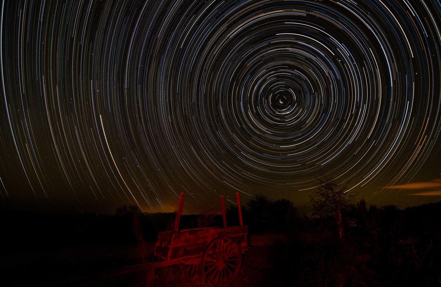 STAR TRAIL OVER OLD WAGON