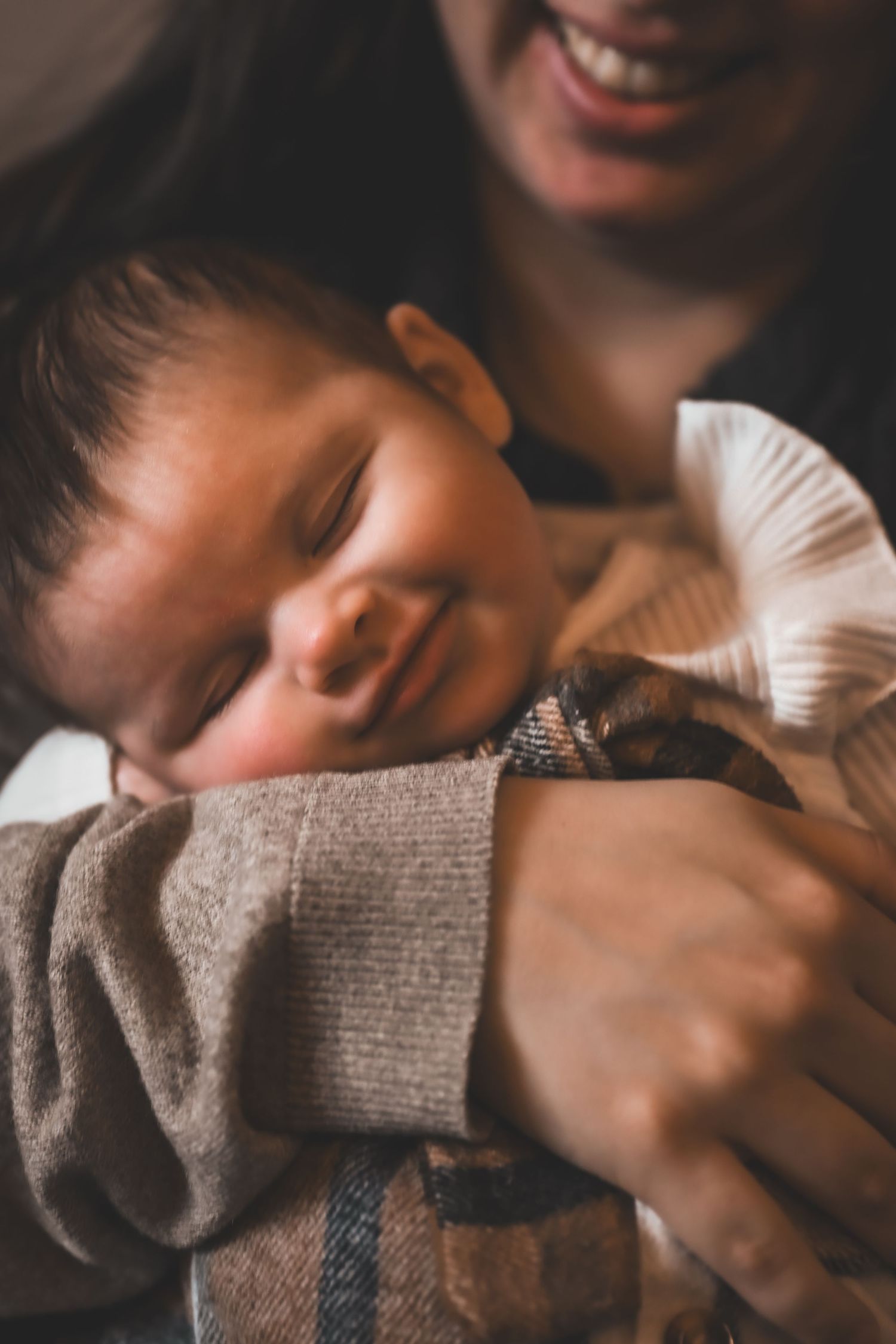 Newborn baby smiling