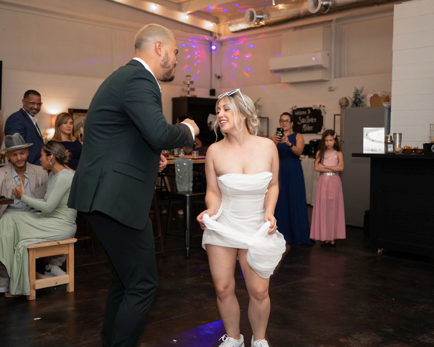 Bride and groom dancing at the reception