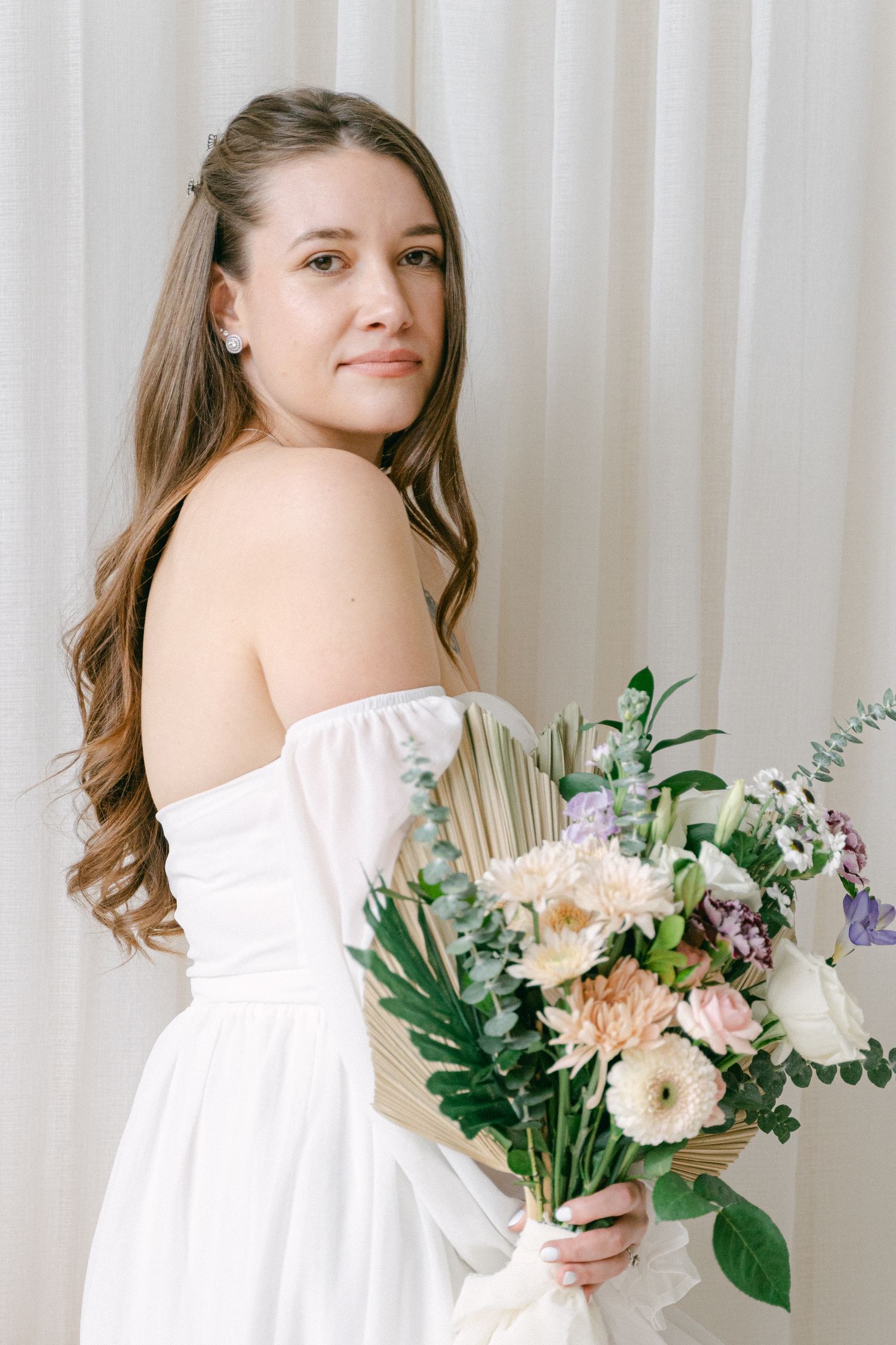 Portrait of A Bride Posing with A Bouquet in Toronto