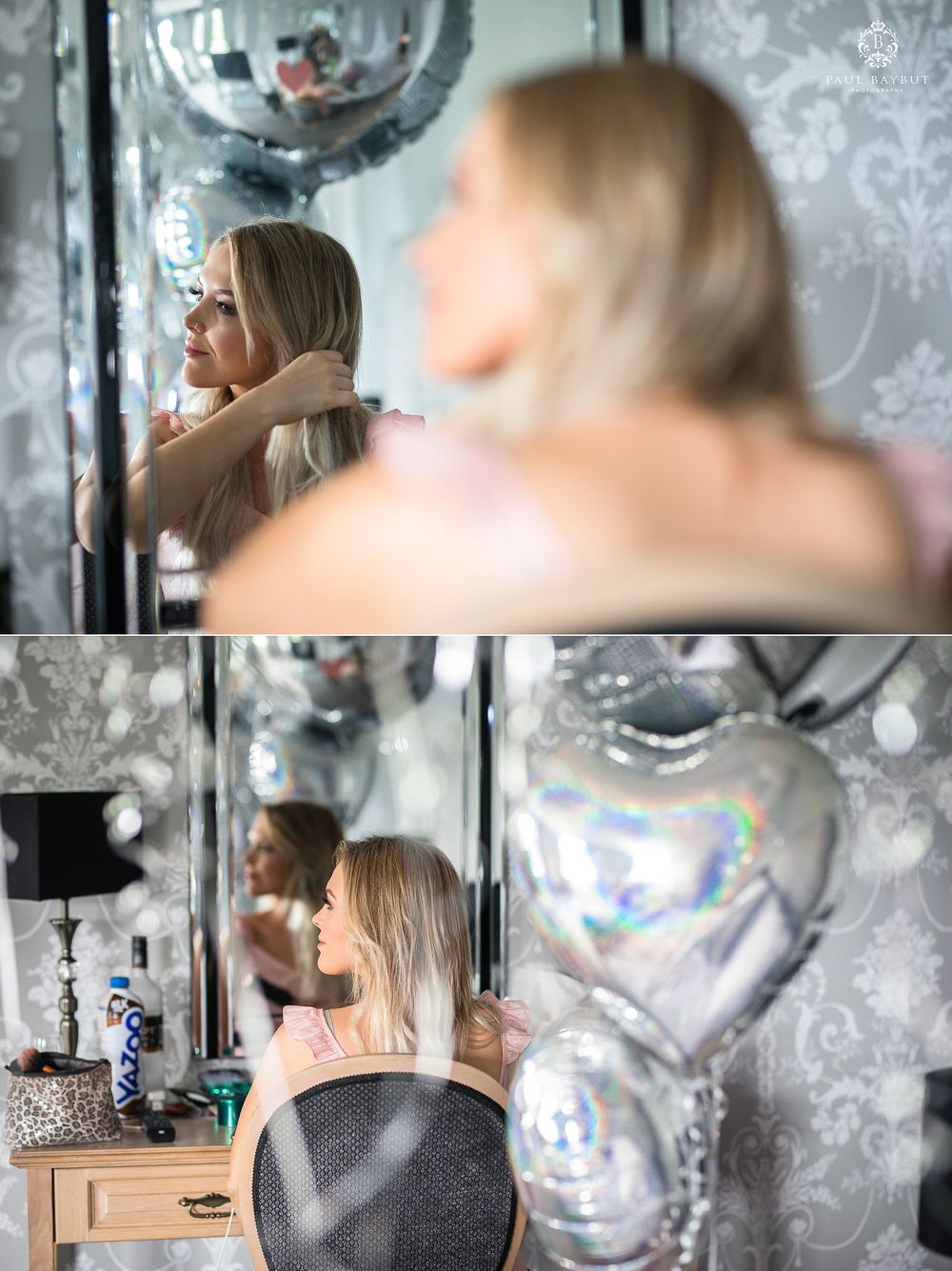 Getting ready in front of a mirror with silver heart balloons decorating the space for a special occasion.