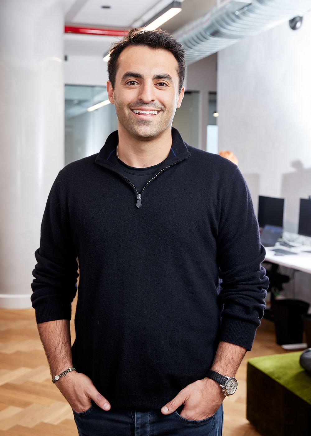 Portrait of a man in a black sweater