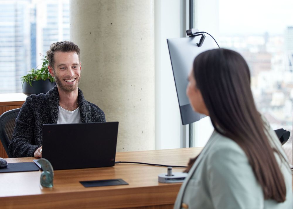 Man and woman talking in a office