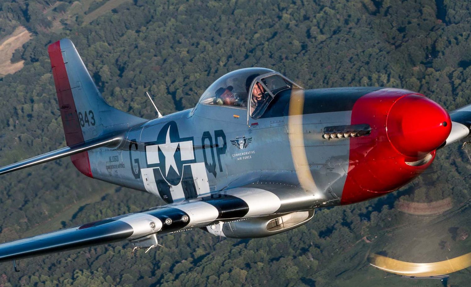 Commemorative Air Force P-51 Mustang "Red Nose" in an Air to Air shoot near Peachtree Dekalb Airport in Atlanta