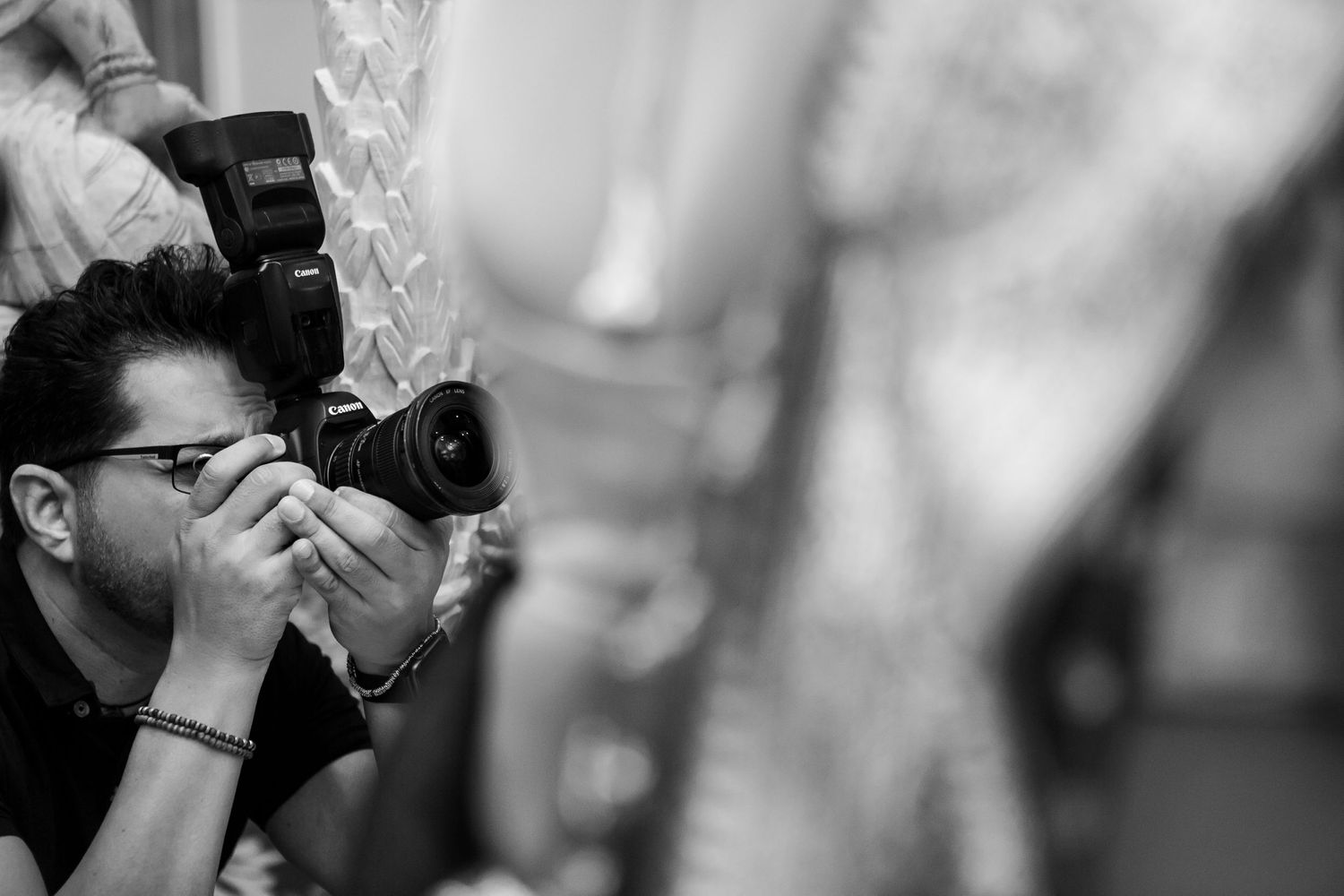 Sher picking up a wide shot at the wedding ceremony.