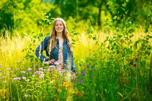 Vibrant wildflowers bloom in a sunny meadow creating a colorful summer scene.