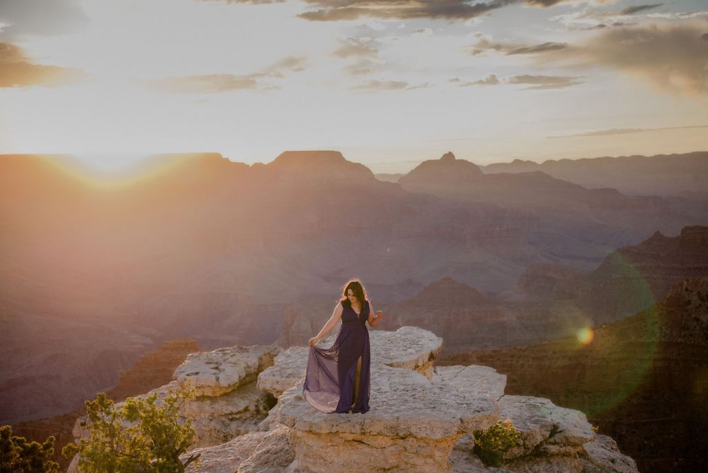 sunrise at the grand canyon. blue dress. modeling photo session. grand canyon. arizona. wedding photographer