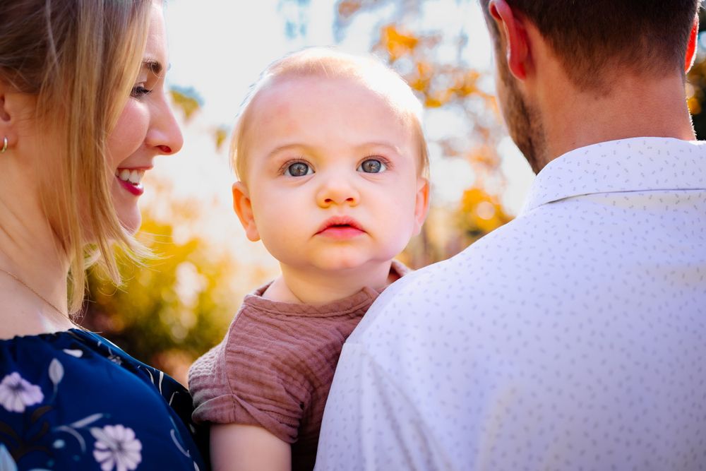 This baby is ready for his closeup. His parents can't help but love on him