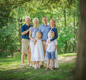 Multigenerational share a loving hug in this stunning portrait