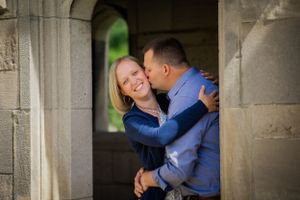 Hugs and kisses galore for this married couple.