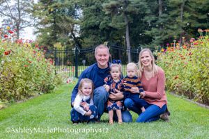 Hugging and smiling captures the innocence of this family
