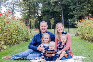 Looking cozy, Hugging and smiling captures the innocence of this family