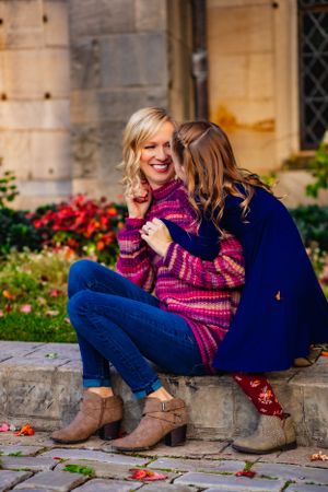 A mom and daughter share an intimate hug