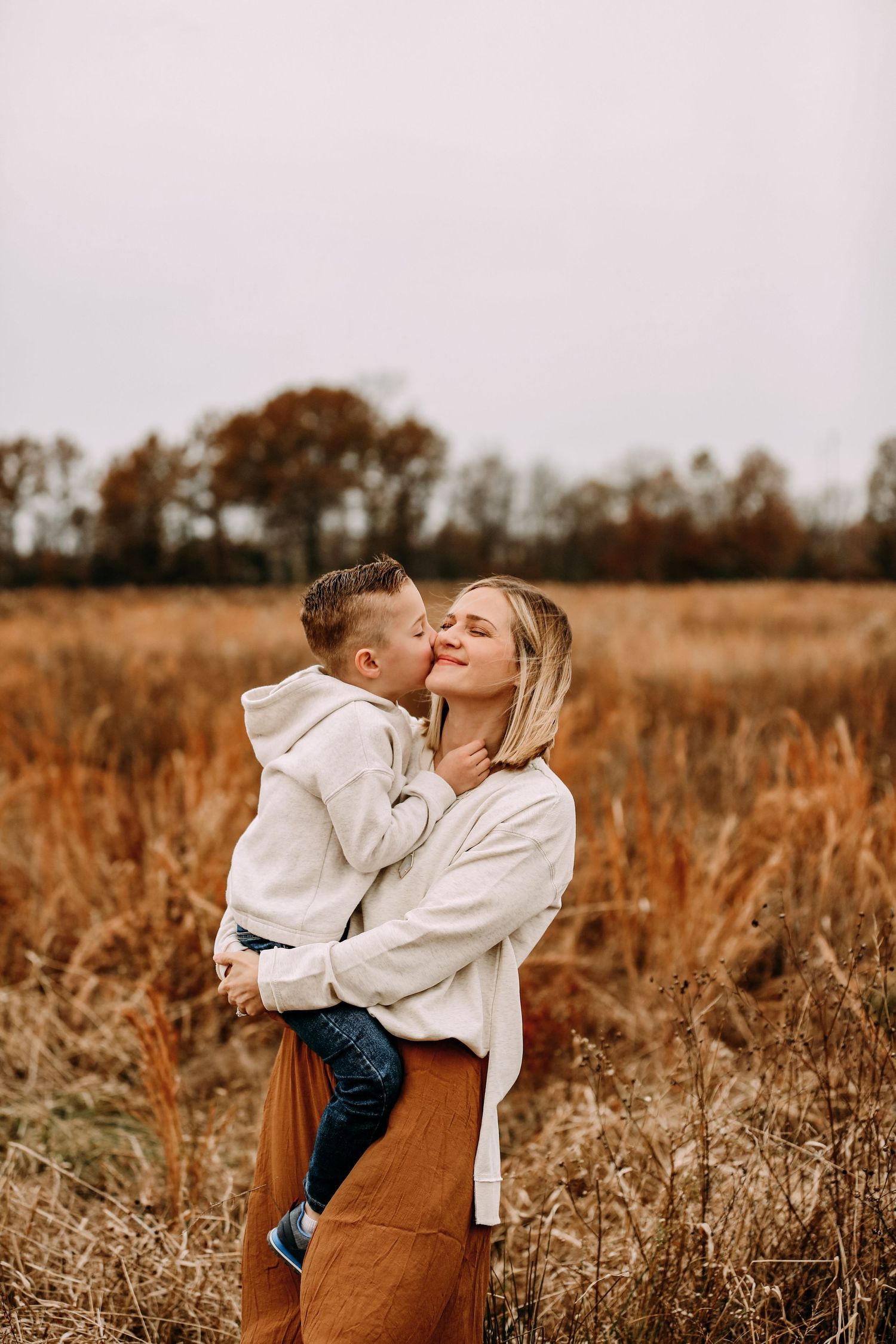 mother and son hugging again