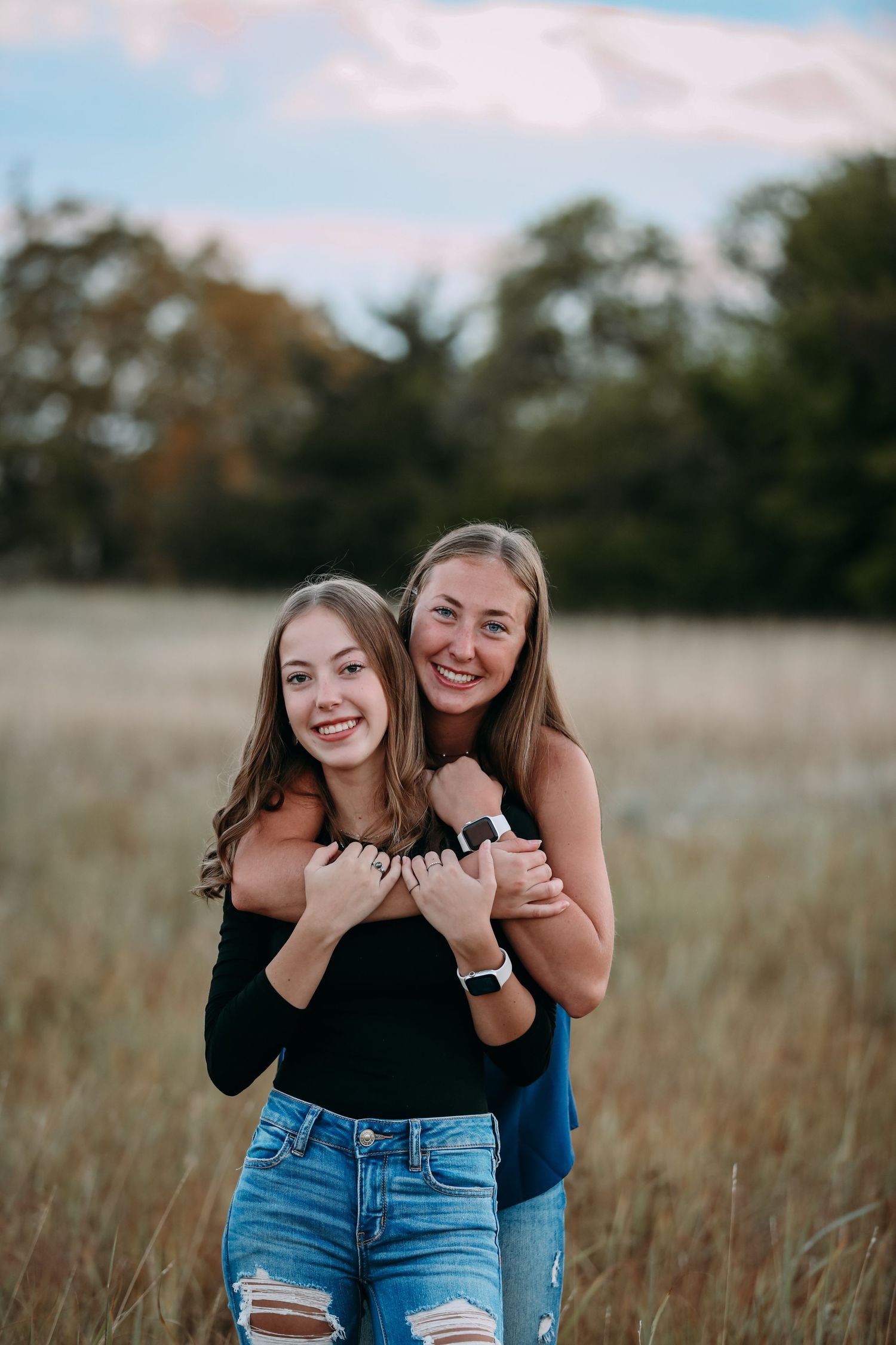 two sisters hugging