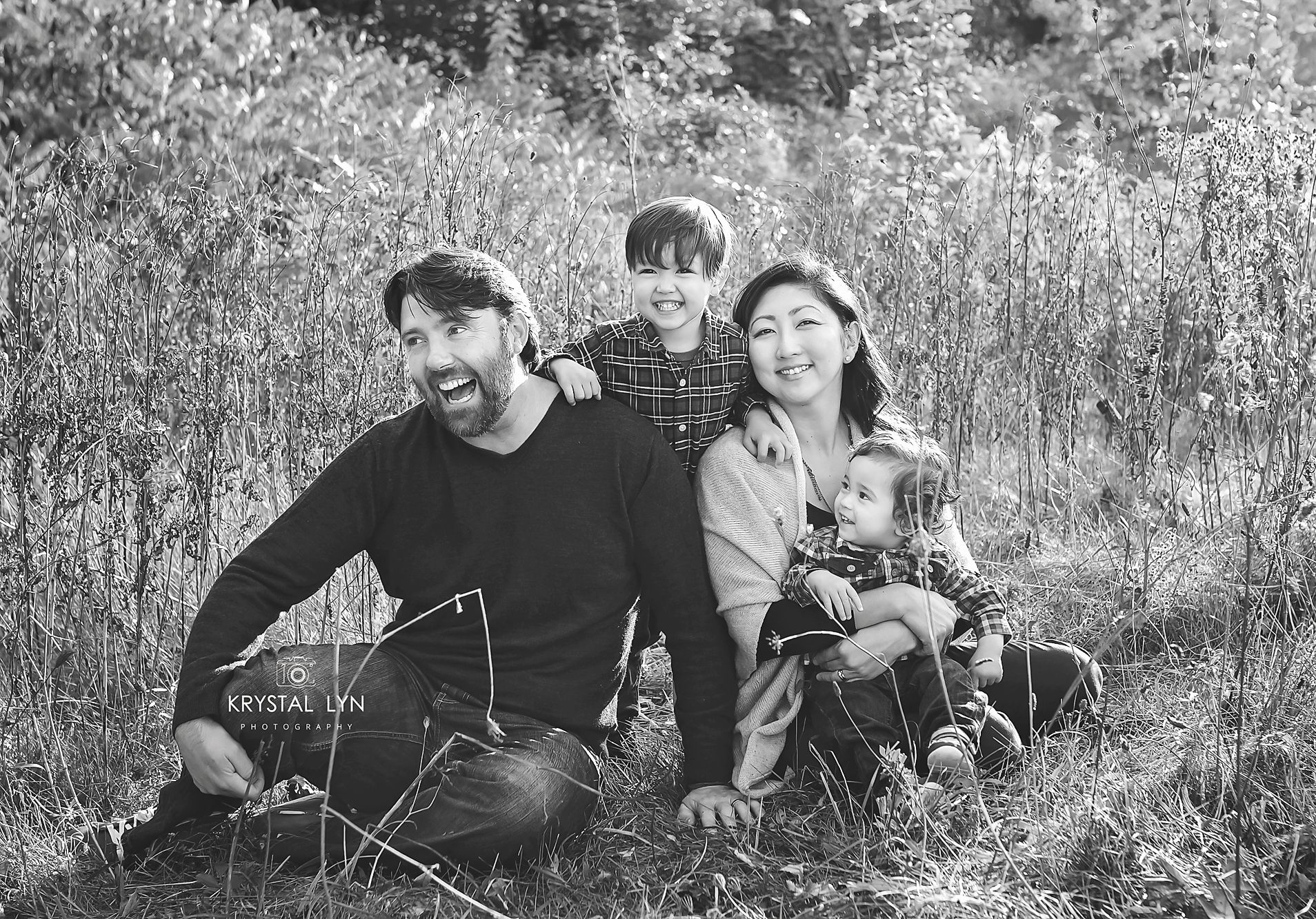 Fun family being themselves during family photos with Mississauga photographer