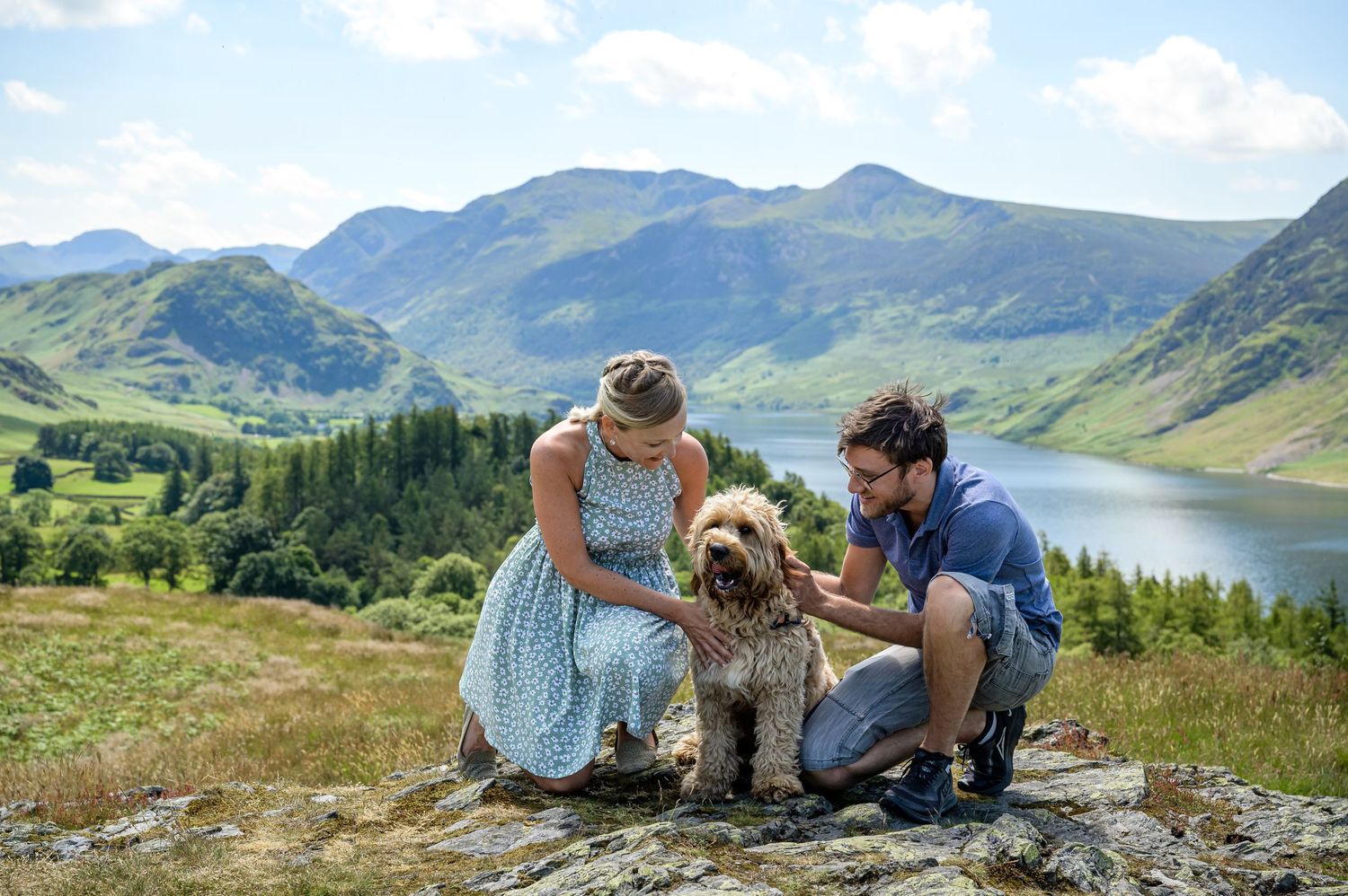 Engaged couple with their dog at Crummock Water in the Lake District