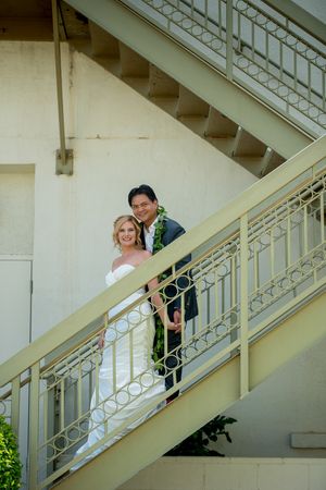 Wedding couple on yellow staircase