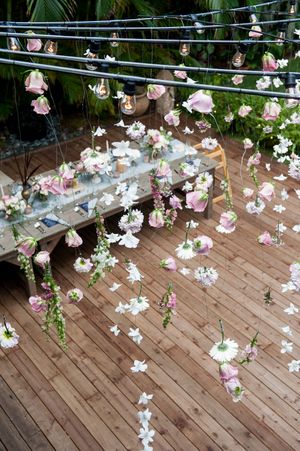 draped flowers hanging at reception outdoors