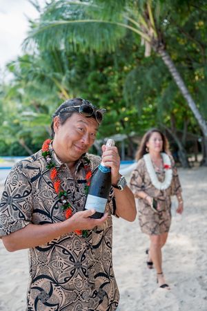 Guest holding champagne bottle