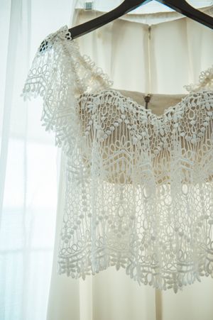 Bohemian wedding dress on hanger