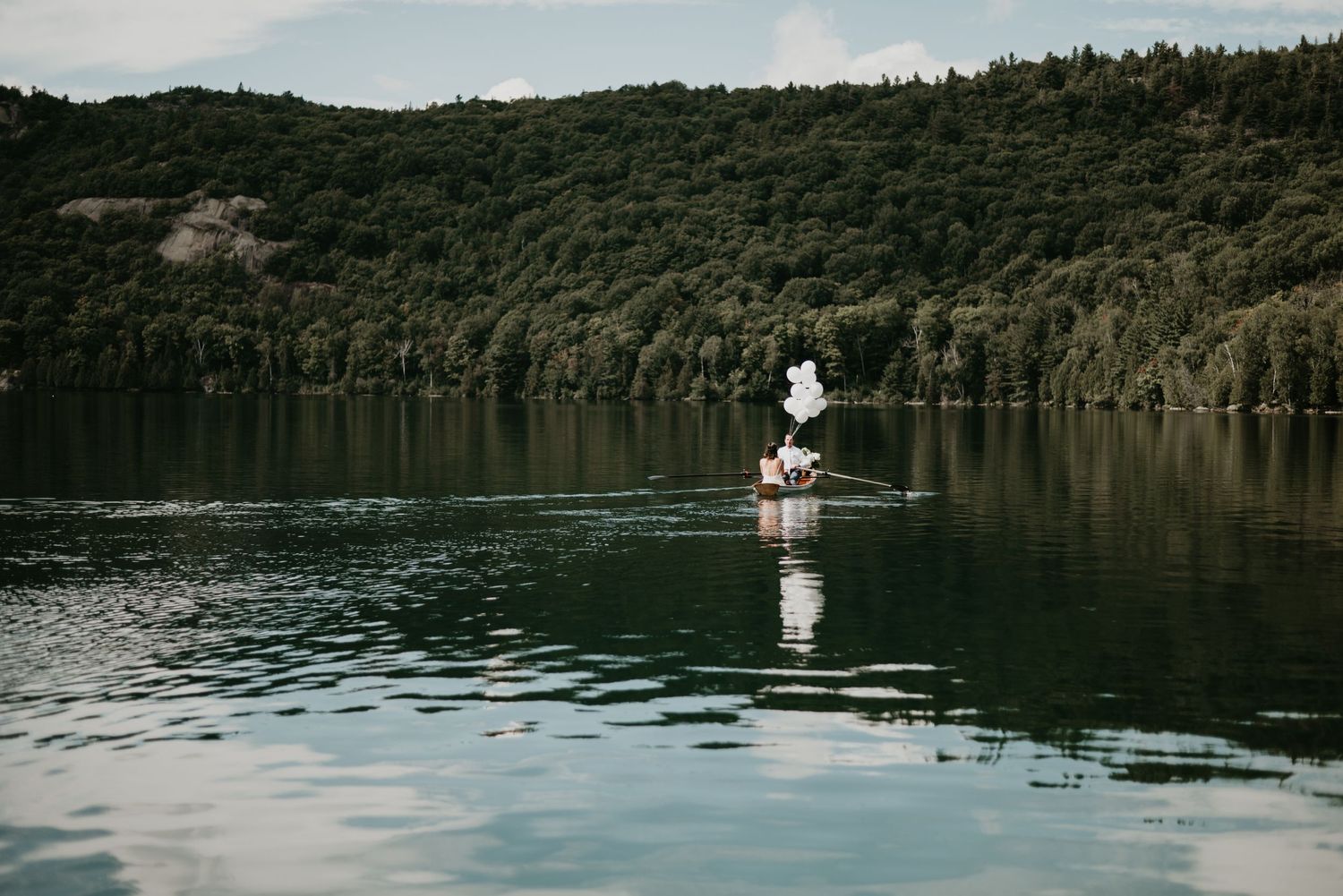 Couple on wedding day on lake