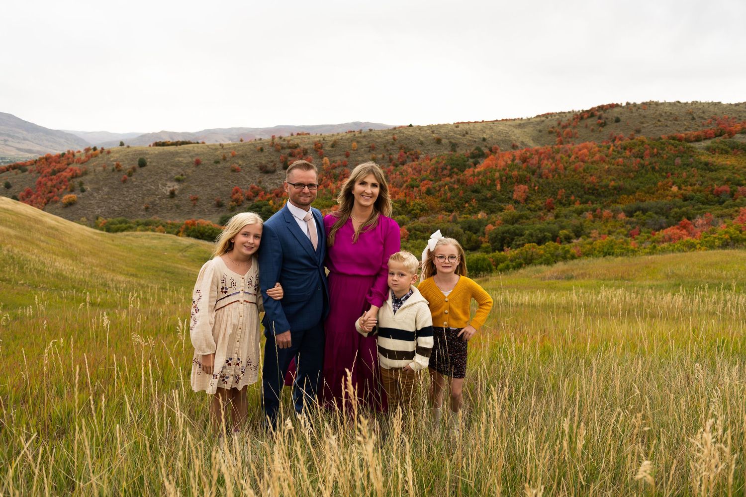 Family photograph with a mountain setting in the fall near Huntsville,  Utah