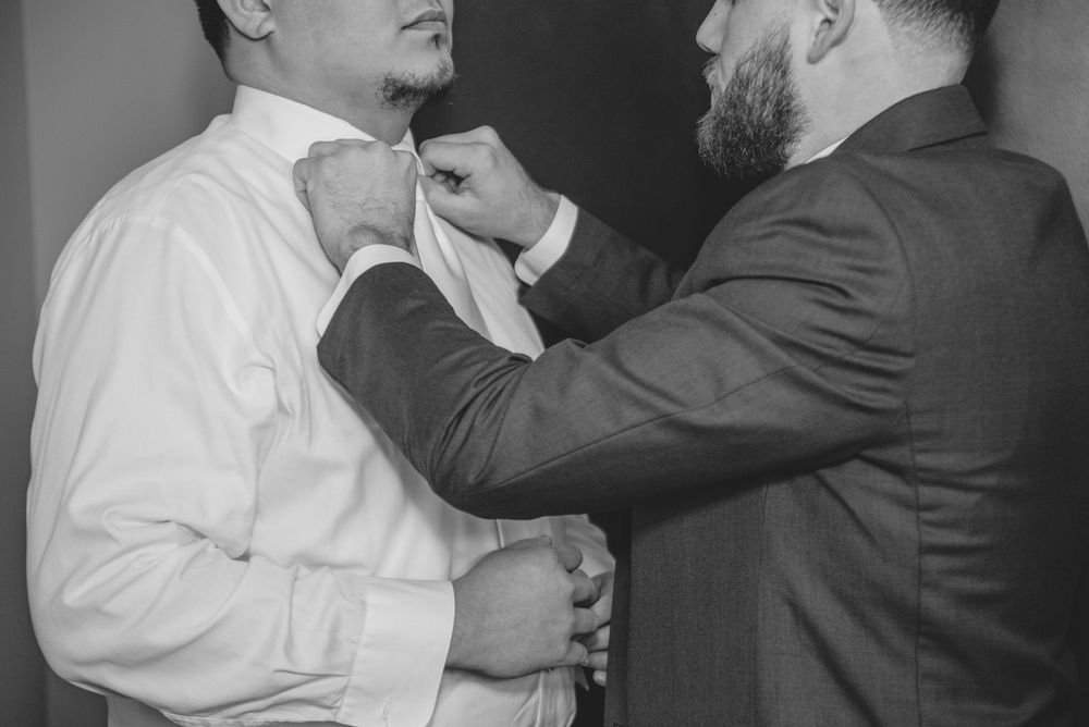 groom getting ready. bow fixing. black and white. bride's accesories. getting ready. Rancho Guadalupe. Edinburg, Texas.