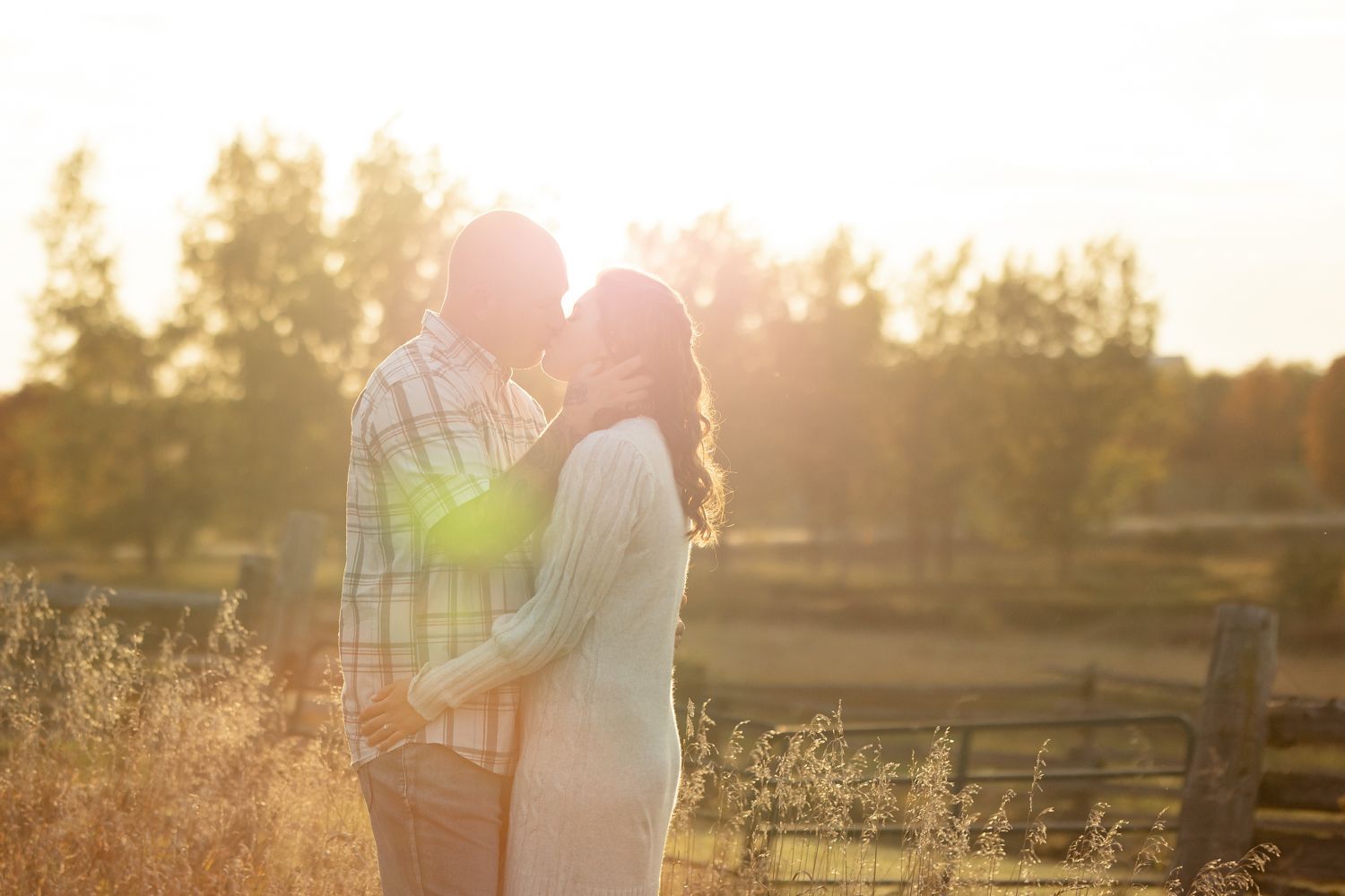A couple kissing in the sunset