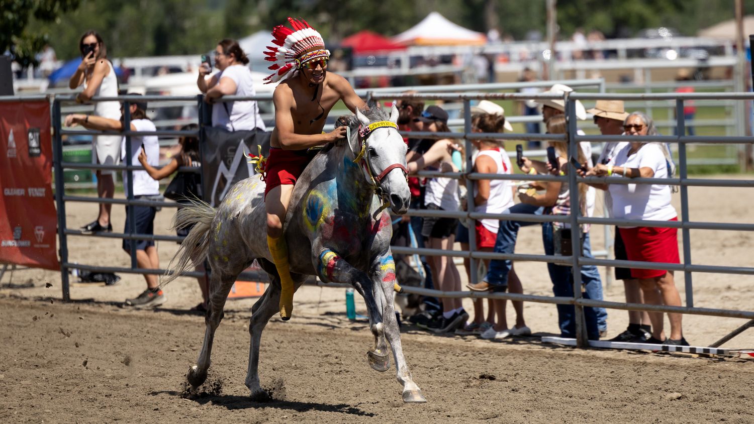 Indigenous Relay with Painted Horses and Head Dresses, Millarville Ab