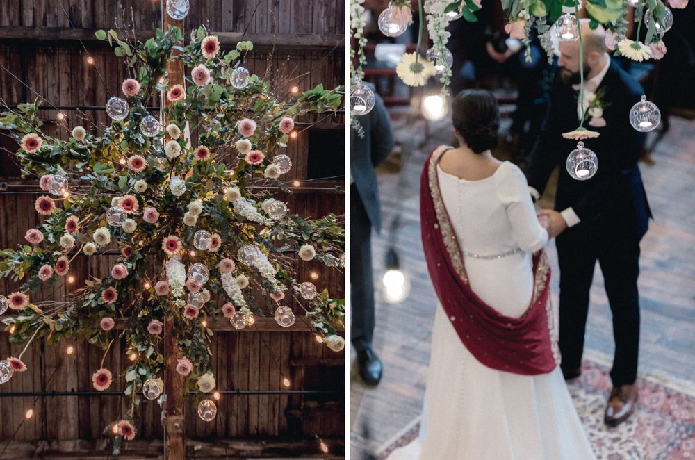 floral center piece at ceremony with bride and groom