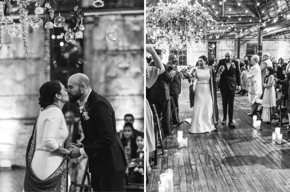 bride and groom kissing at ceremony