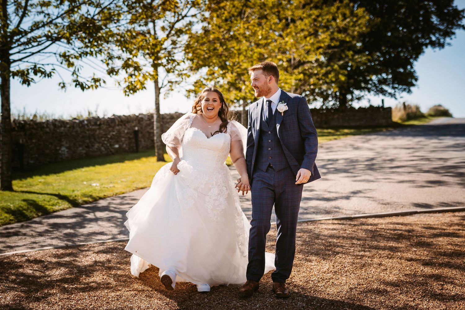 Stone Barn Laughing happy newly wed bride and groom Wedding photography www.vickyphotography.co.uk