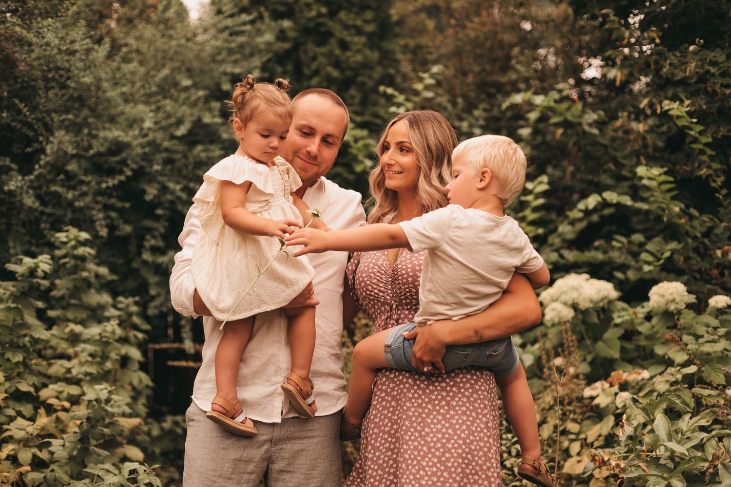 Candid family gathering photos in a lush garden setting.