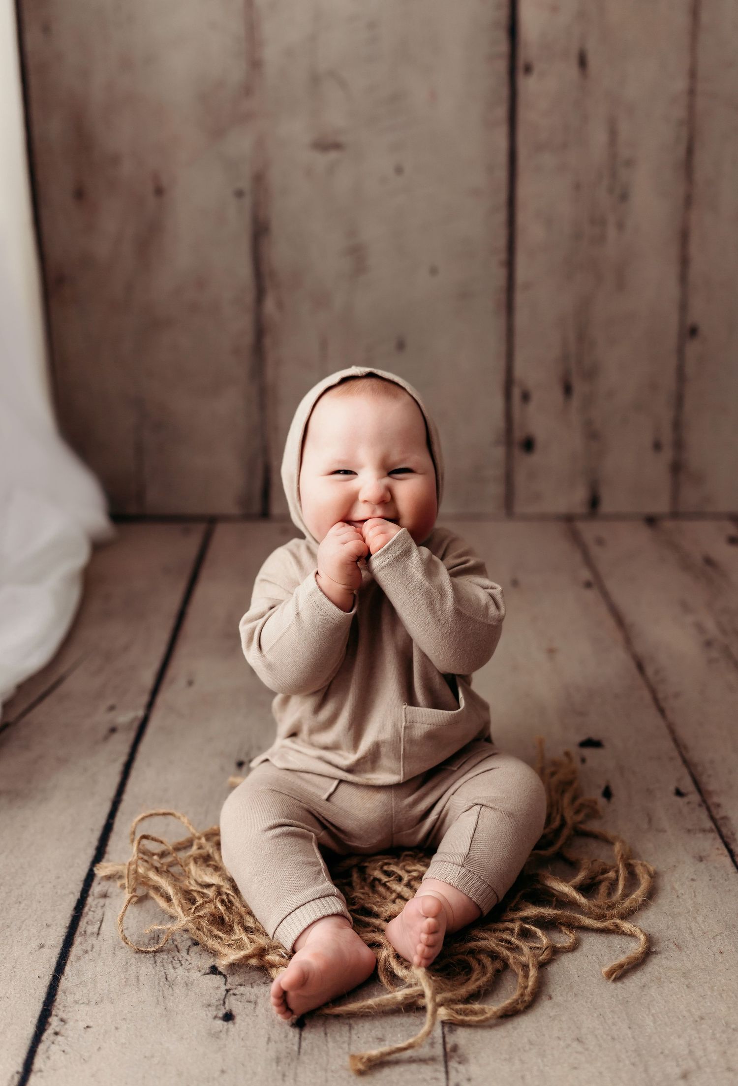 baby boy laughing at his milestone session in Broken Arrow,OK