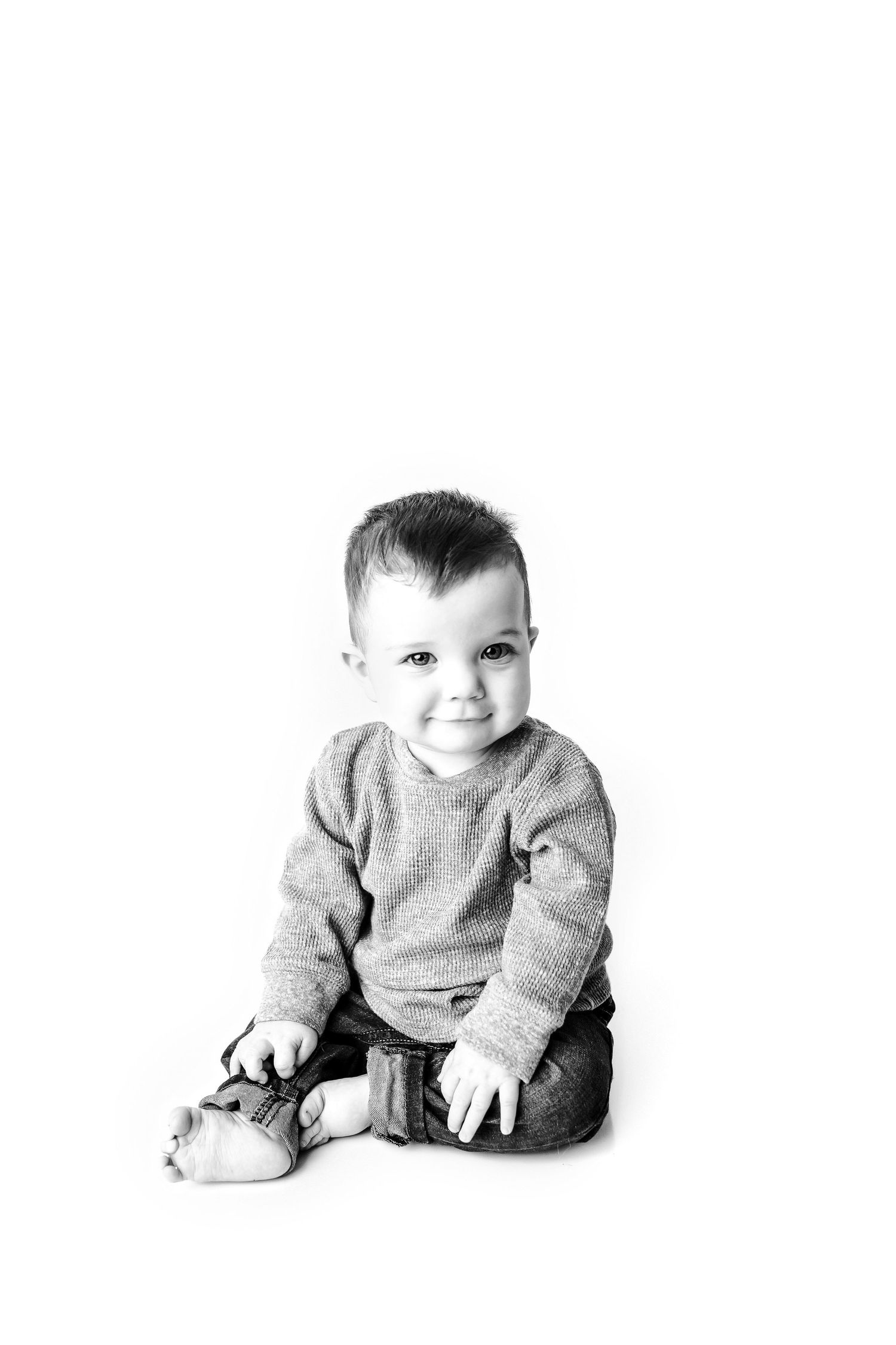 Baby boy sitting at his milestone session in Tulsa,OK