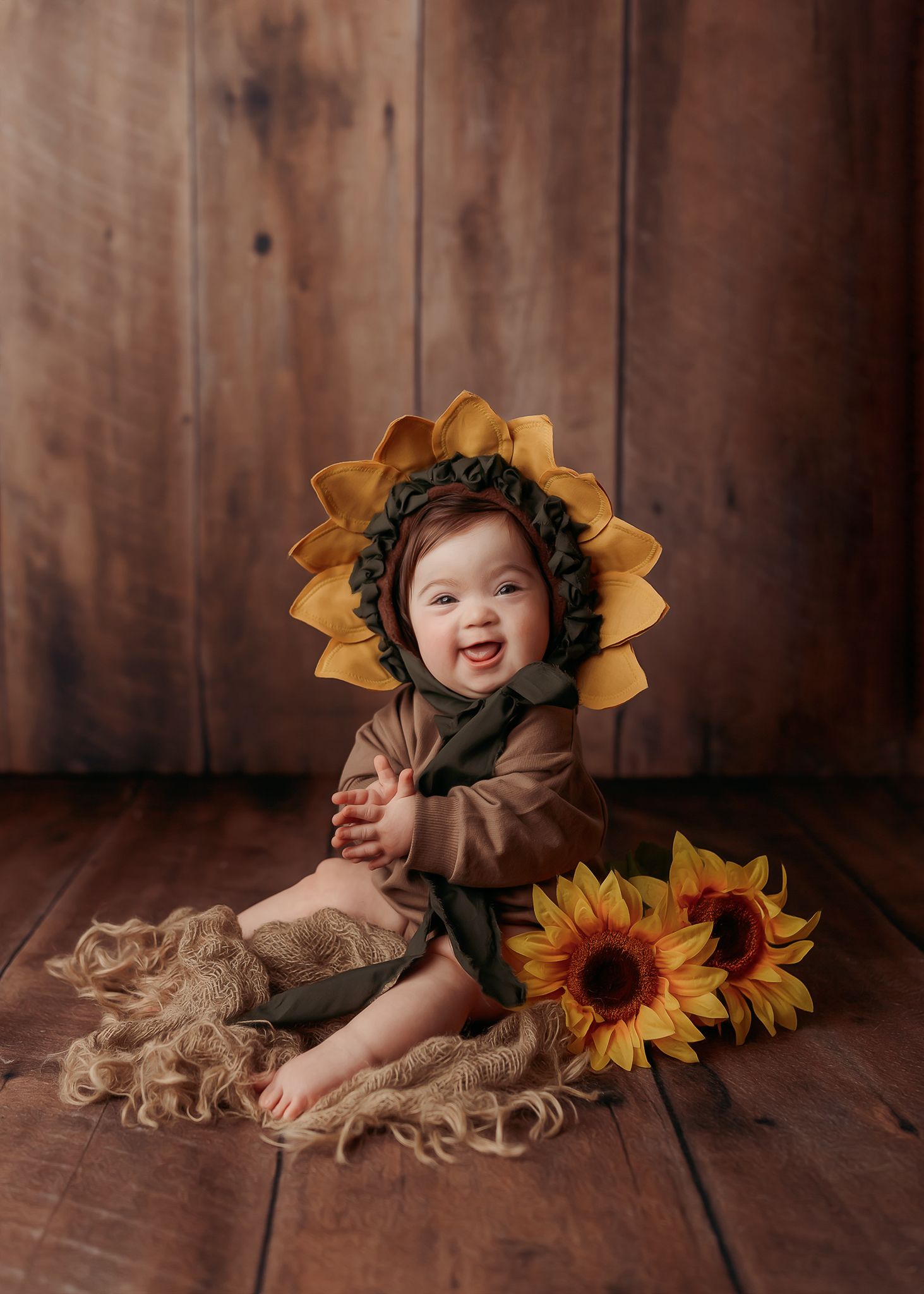baby girl dressed as a sunflower for her milestone session in tulsa,ok