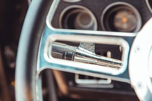 Close-up detail of car interior dashboard controls and vents.