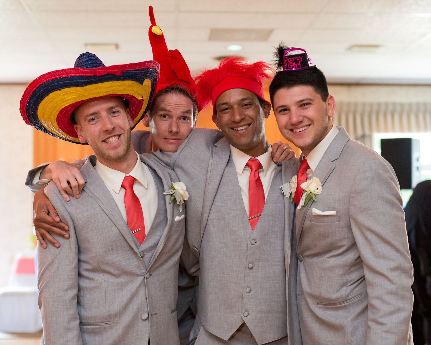 Groomsmen introduction props funny hats wedding reception Leah Ramuglia Photography Harris-Pelham Inn NH