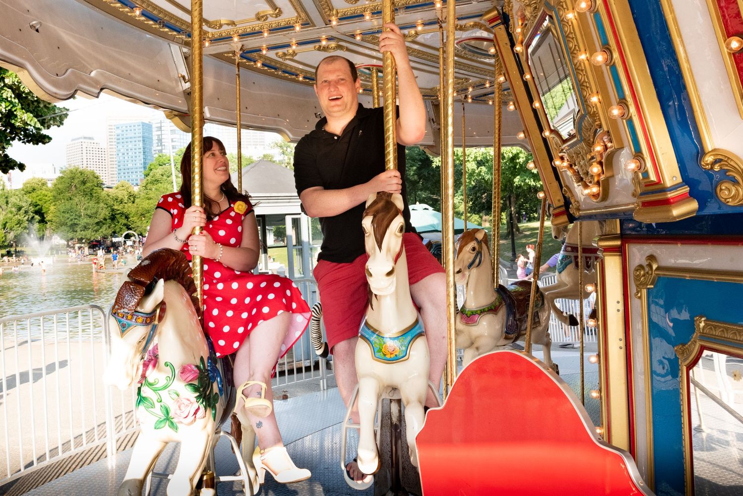 Engagement portraits Boston Common Carousel Leah Ramuglia Photography couple ride