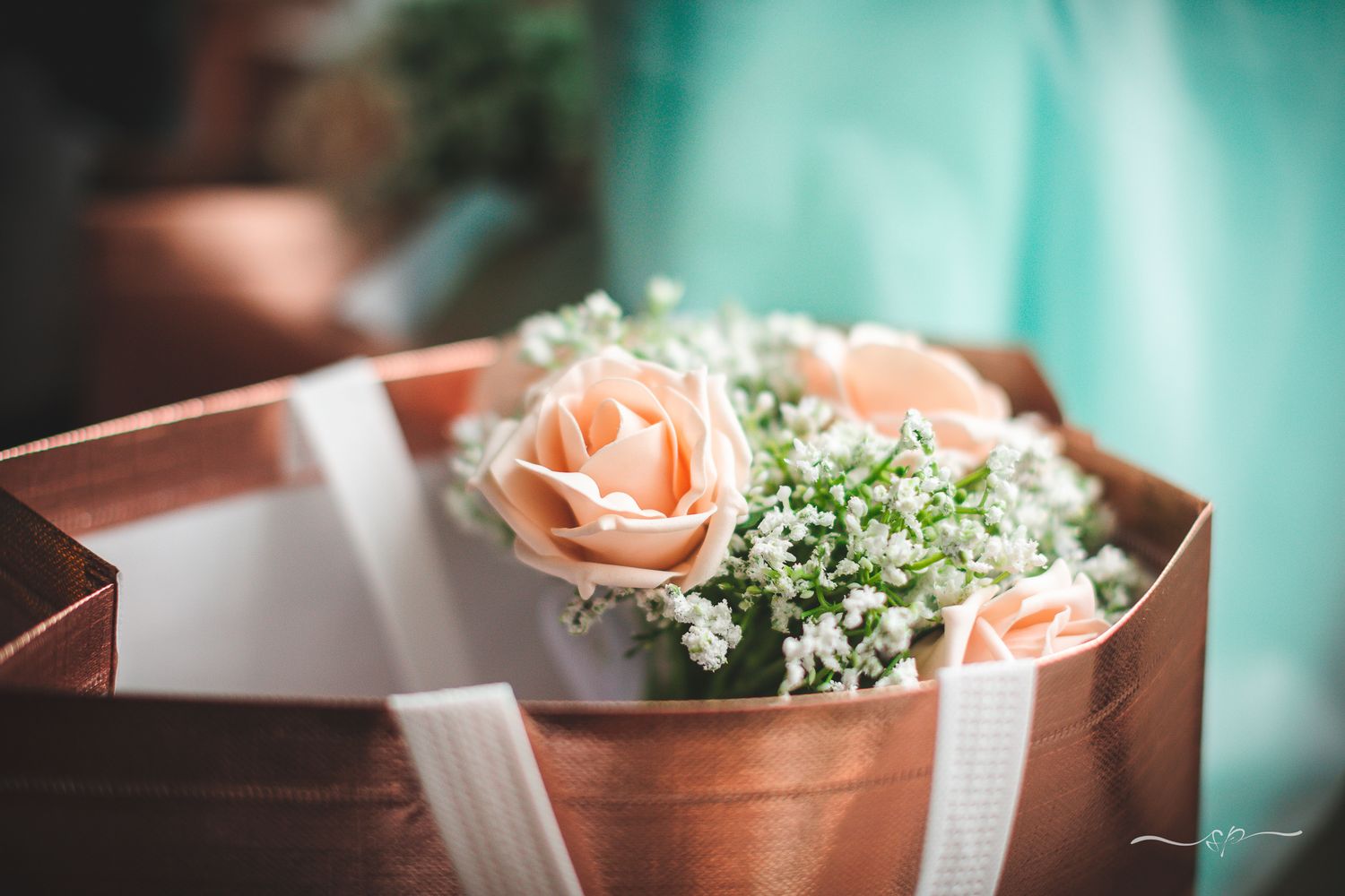 Wedding flower bucket in peach colour, handmade artificial flowers for bridesmaids.