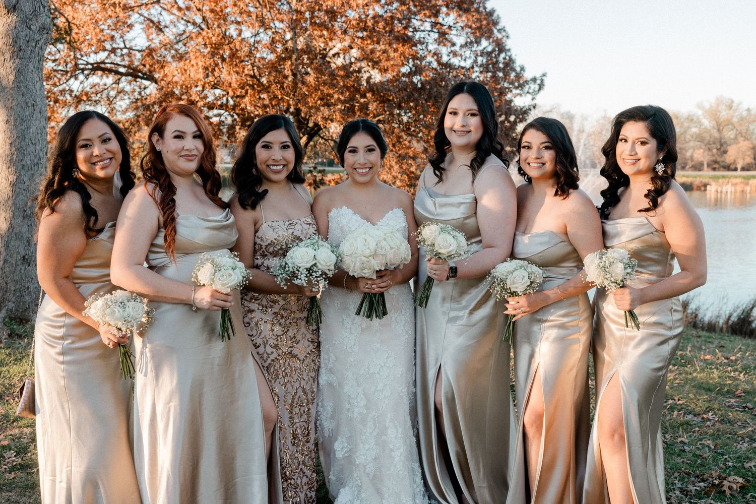 bride and her brides maids posing for a beautiful photo