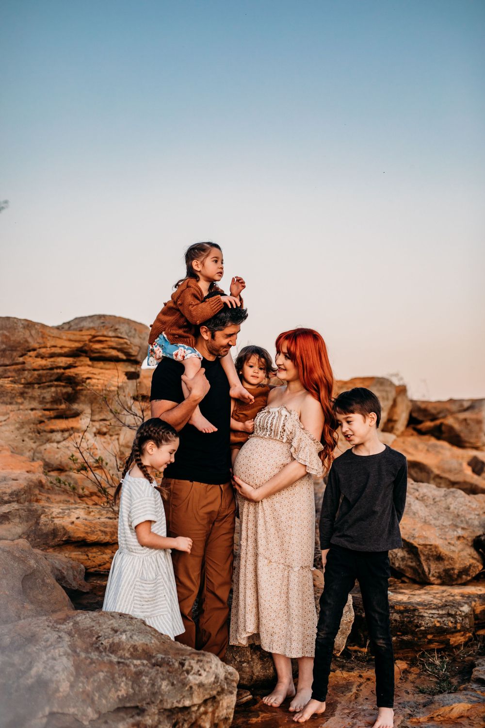 new braunfels family photographer, family of six standing looking at eachother