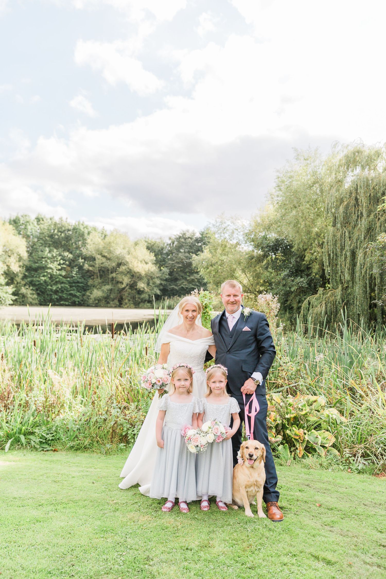 Hayley Elizabeth Photography Dogs at weddings family photo at Lyde Arundel Herefordshire with labrador
