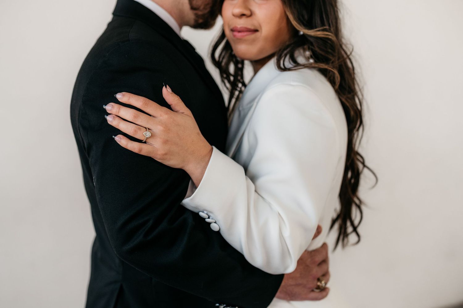 Engaged man and woman in Houston photography studio.